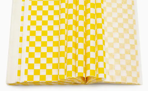What is grease proof paper used for?